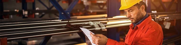 Man troubleshooting a packaging machine