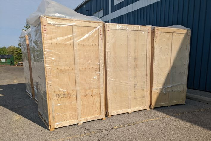crates wrapped with poly sheeting