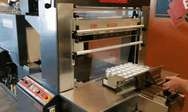 B-34 Semi-Automatic Sleeve Wrapper - Impak Packaging Systems