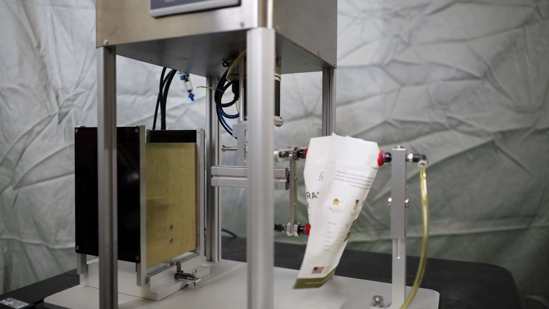 Tabletop Pouch Opener Video Frame (1)